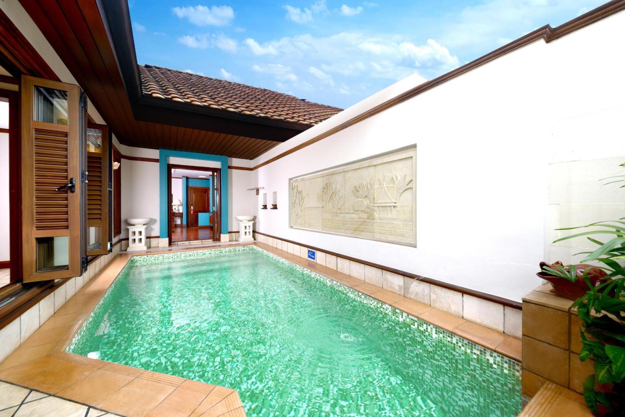 Grand Lexis Port Dickson Hotel Exterior photo A pool at the hotel